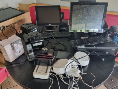 a table with a lot of electronics on top of it