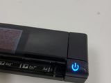 a close up of a cell phone with a blue light on it