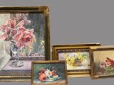 four paintings of flowers in a vase on a table