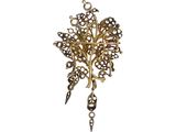 a close up of a gold broochle with pearls on a white background