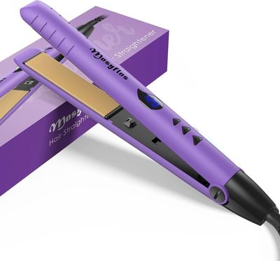 un gros plan sur un fer à lisser violet dans une boîte violette