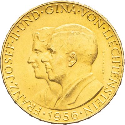 une image montrant un gros plan d'une pièce d'or sur laquelle figurent deux hommes
