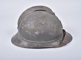 a helmet that is sitting on a white surface
