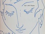 drawing of a woman ' s face with her eyes closed and her name written on it