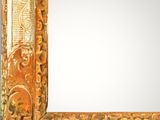 an image of a mirror with a gold frame on a white background