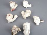 a group of white figurines that are on a table