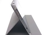 a tablet that is sitting on top of a stand