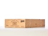 a wooden box that has a wine bottle inside of it