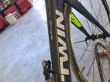 a bike that is sitting on a stand in a garage