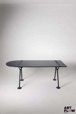 a black table with a black top on a white background