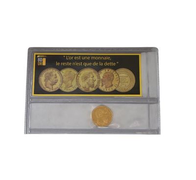 the coin is in a clear plastic holder with a label on it