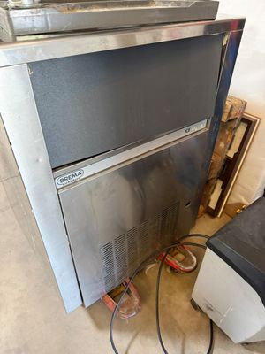 an image of a kitchen with a stove and a dishwasher