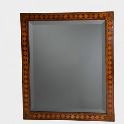 an image of a mirror on a wall in a room