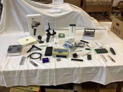 a table that has a lot of electronics on it