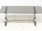 an image of a glass and chrome coffee table
