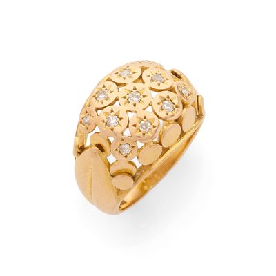 une bague en or jaune 18k et diamants