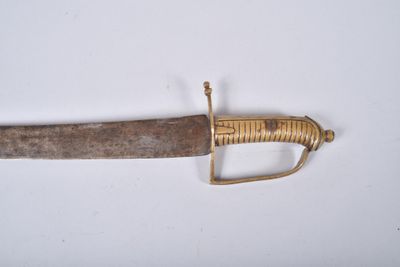 an image of a very old sword on a white surface