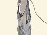 a glass bottle with a handle on a white background