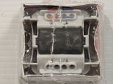 a plastic box with a toy robot inside of it