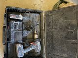 a box with tools in it sitting on the floor