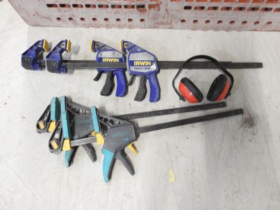 a bunch of tools that are laying on the floor