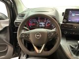the interior of a car with a steering wheel, dashboard, and dash board