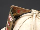 a close up of a fireman ' s hat with a fireman ' s badge on it
