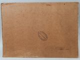 an open box with a stamp on it sitting on top of a table