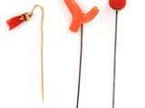 three different types of tools on a white surface