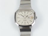 an image of a close up of a wrist watch on a white surface