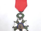 an image of a red ribbon with a star on it