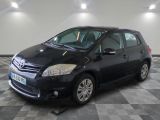 a picture of a black car parked on a checkered floor