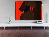 a painting on the wall of a modern living room