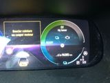 a car dashboard with a digital display on it