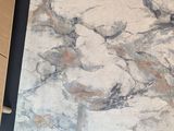 a picture of a marble floor in a room