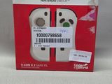 emballage d'une manette Nintendo Wii posée sur une table blanche