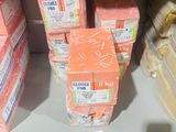 many boxes of orange soap on a shelf in a store