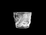 an image of a glass cup on a black background