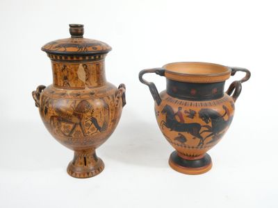 two vases sitting next to each other on a white surface