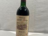 a bottle of wine that is sitting on a table