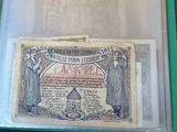 a picture of a paper money in a clear box