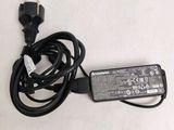 an image of a laptop charger with a cord attached to it