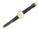 an image of a wrist watch on a white surface with a black strap