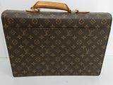 louis vuitton monogram canvas suitcase with brown leather handle