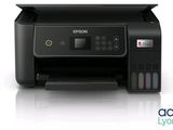 a black printer sitting on top of a white surface
