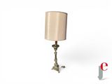 a lamp that is sitting on a table next to a lamp