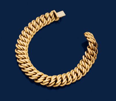 BRACELET en or jaune 750 mil. à double maille gourmette. Fermoir cliqu - Photo 1