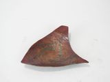 a small piece of pottery on a white surface