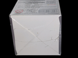 a white box that has a black and red label on it