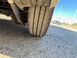 a close up view of a tire on a truck